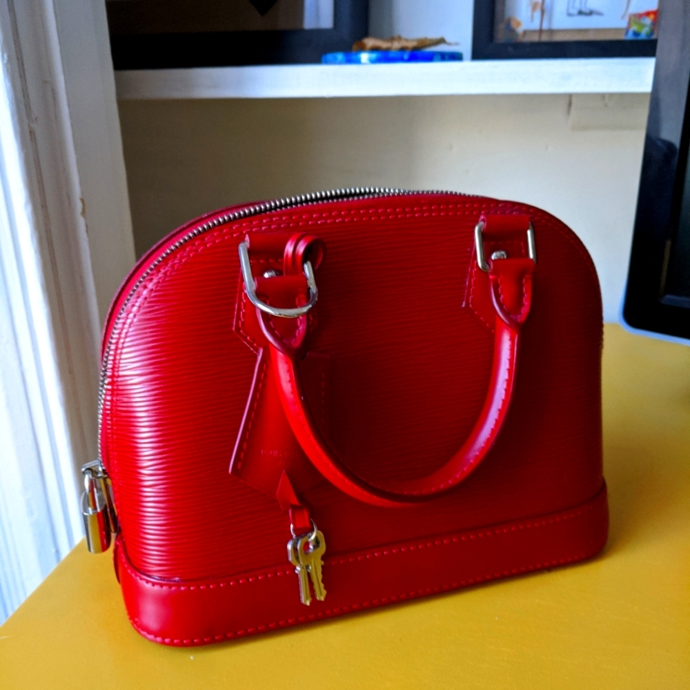 Cherry red Louis Vuitton purse